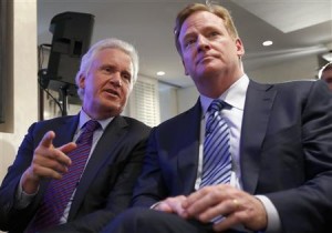 Jeff Immelt, Chairman and CEO of General Electric and Roger Goodell, Commissioner of the National Football League (NFL), speak together during a news conference announcing the Head Health Initiative in New York